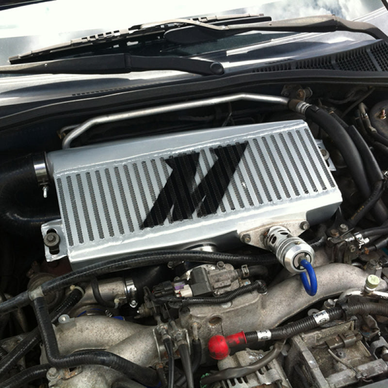 Mishimoto Subaru 02-07 WRX/04-07 STi Top-Mount Intercooler Kit - Powder Coated Silver & Red Hoses